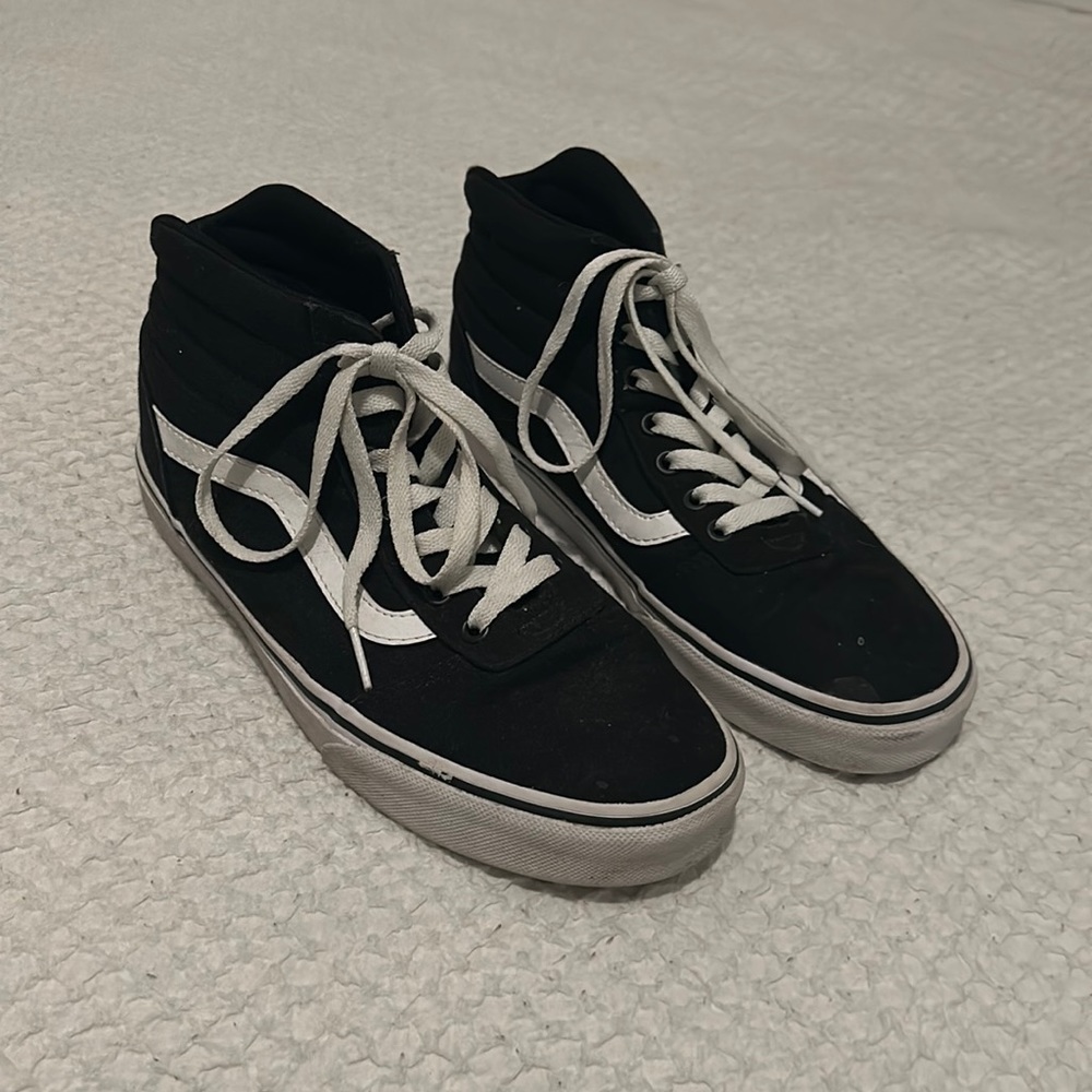 Black hightop vans, women’s size nine. In good condition!